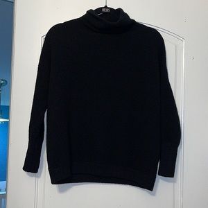 Black turtle neck sweater